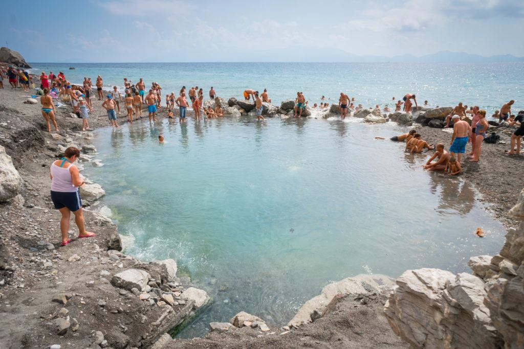Things To Do In Kos: Soak In A Natural Coastal Hot Spring - Therma Black Sand Beach